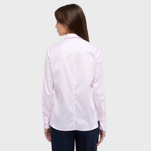 Load image into Gallery viewer, female model wearing eterna shirt in pink colour with arms down by side 
