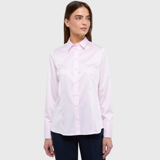 female model wearing eterna shirt in pink colour with arms down by side 