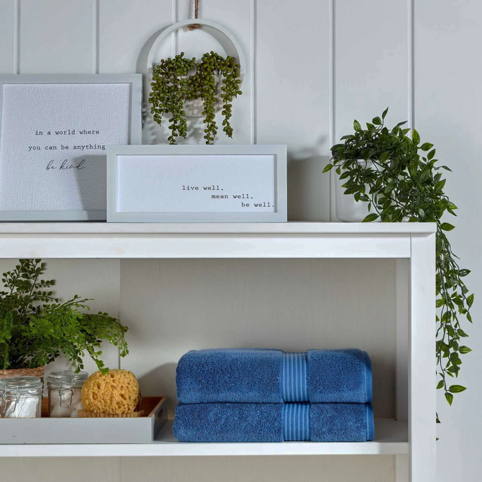 Towels Stacked on a Shelf