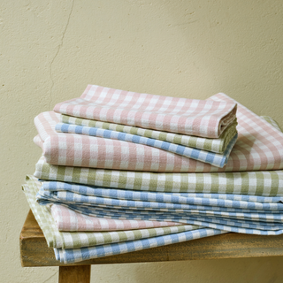 Stack of Tablecloths and Napkins