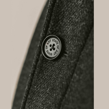 Load image into Gallery viewer, Button Detail on Coat 
